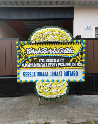 Papan Bunga Duka di Warnasari